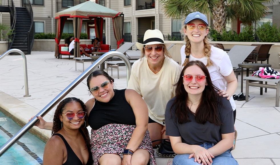 Dental team members at the pool