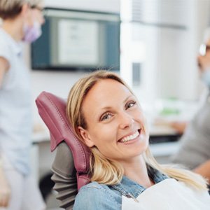 Woman smiling in the dental chair