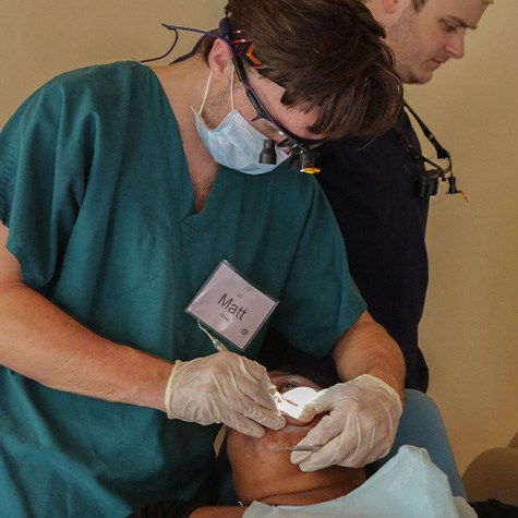 Doctor Hiner treating dental patient