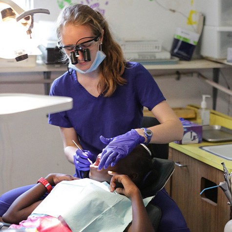 Doctor Hiner treating dental patient