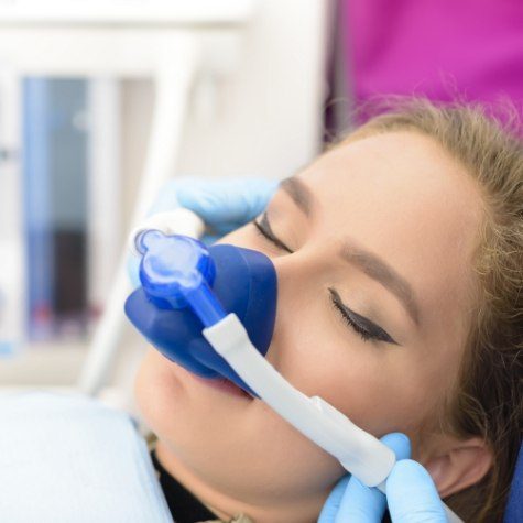 Patient receiving nitrous oxide dental sedation