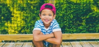 Child smiling after children's dentistry visit