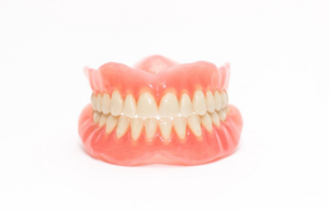 A set of dentures on a white background